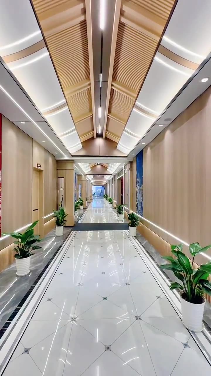 Marble-effect waterproof wall panels installed in a hotel bathroom area